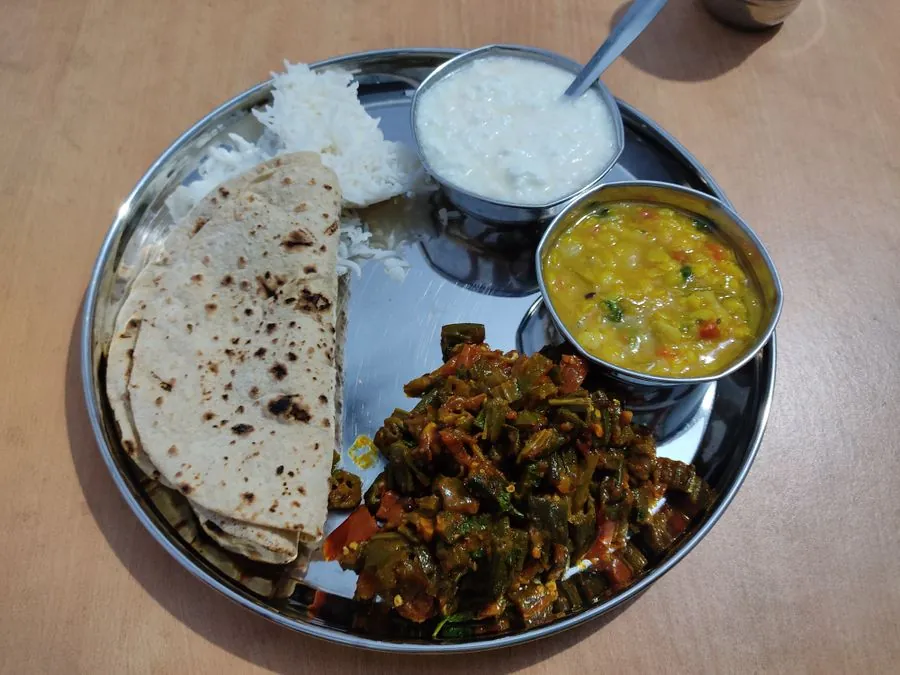 A home-style thali with roti, dal, sabzi and rice